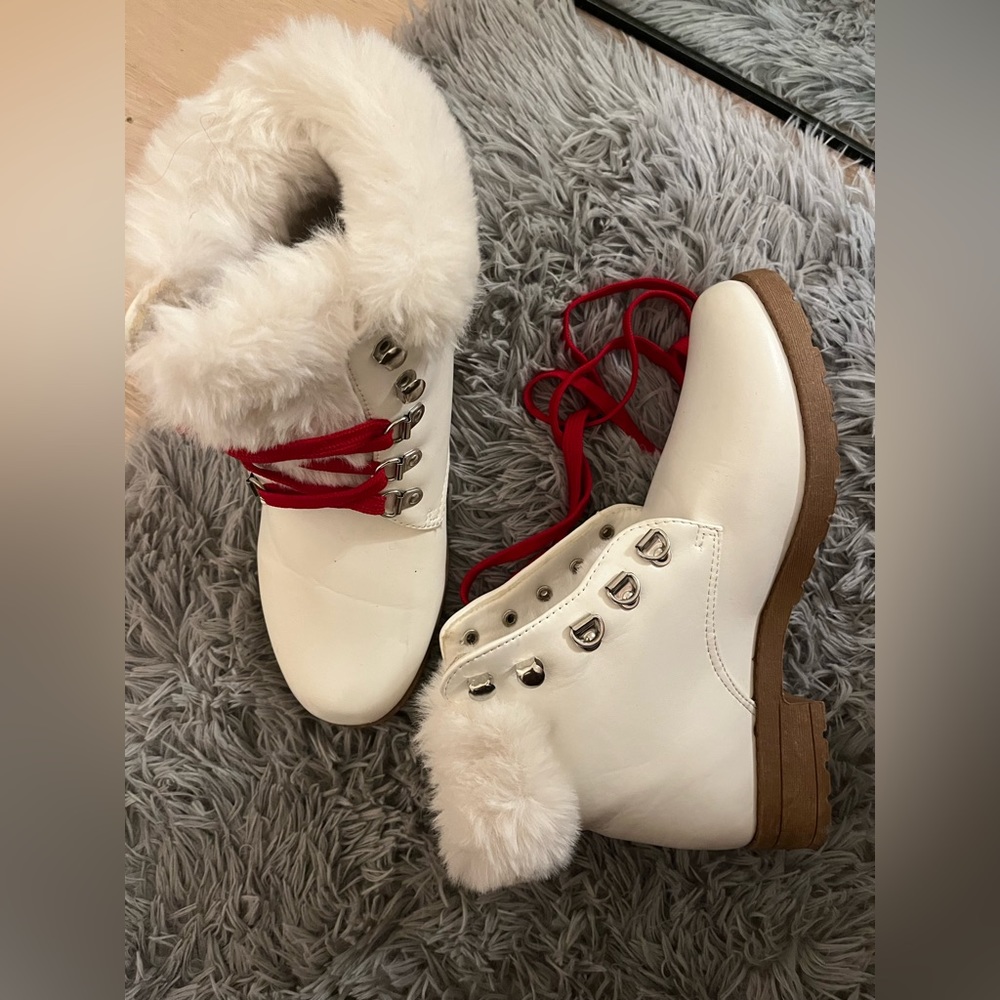 >White boots with red lace